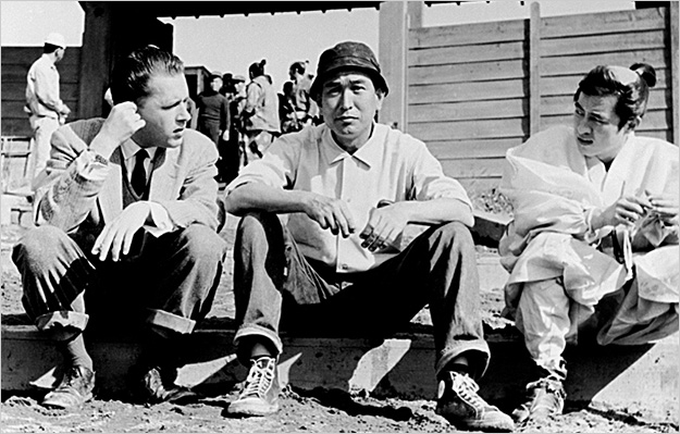 Donald Richie (left) with Akira Kurosawa (center)